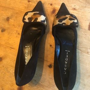 Black suede with a band of animal print material like fur.